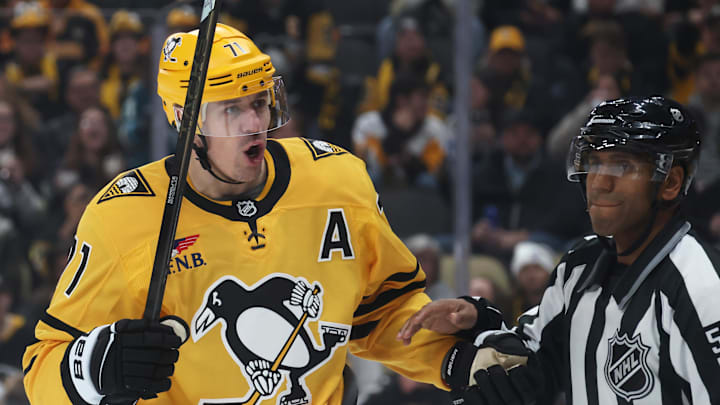 Nov 22, 2025; Pittsburgh, Pennsylvania, USA; Pittsburgh Penguins center Evgeni Malkin (71) reacts to the Seattle Kraken as linesman Shandor Alphonso (52) restrains Malkin during the third period at PPG Paints Arena. Mandatory Credit: Charles LeClaire-Imagn Images Nov 22, 2025; Pittsburgh, Pennsylvania, USA; Pittsburgh Penguins center Evgeni Malkin (71) reacts to the Seattle Kraken as linesman Shandor Alphonso (52) restrains Malkin during the third period at PPG Paints Arena. Mandatory Credit: Charles LeClaire-Imagn Images