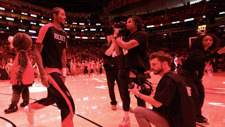 Apr 13, 2025; Houston, Texas, USA; Houston Rockets guard Jalen Green (4) is introduced before playing against the Denver Nuggets at Toyota Center. Mandatory Credit: Thomas Shea-Imagn Images