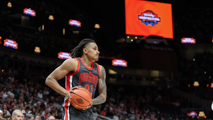 Dec 14, 2024; Atlanta, Georgia, USA; Ohio State Buckeyes forward Devin Royal (21) in the game against the Auburn Tigers during the first half at State Farm Arena. Mandatory Credit: Jordan Godfree-Imagn Images