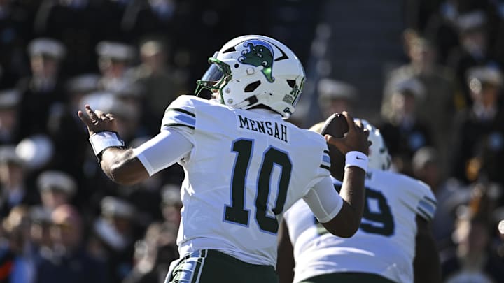 Nov 16, 2024; Annapolis, Maryland, USA; Tulane Green Wave quarterback Darian Mensah (10) drops back to pass during the first quarter against the Navy Midshipmen   at Navy-Marine Corps Memorial Stadium. Mandatory Credit: Tommy Gilligan-Imagn Images