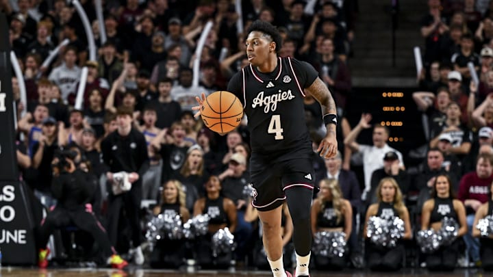 Feb 22, 2025; College Station, Texas, USA; Texas A&M Aggies guard Wade Taylor IV (4) dribbles the ball during the first half against the Tennessee Volunteers at Reed Arena. Mandatory Credit: Maria Lysaker-Imagn Images 