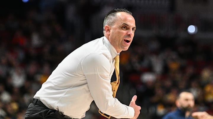 Dec 20, 2025; Iowa City, Iowa, USA; Iowa Hawkeyes head coach Ben McCollum reacts against the Bucknell Bison during the second half at Casey’s Center. Mandatory Credit: Jeffrey Becker-Imagn Images