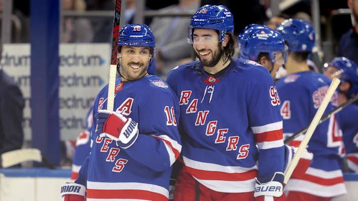 Nov 10, 2025; New York, New York, USA; New York Rangers center Vincent Trocheck (16) laughs with center Mika Zibanejad (93) during the second period against the Nashville Predators at Madison Square Garden. Mandatory Credit: Brad Penner-Imagn Images