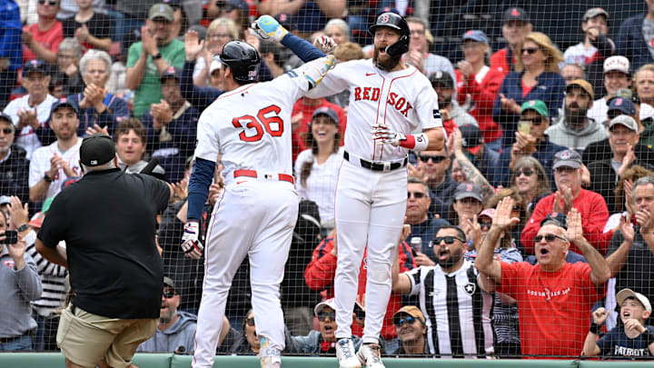 Boston Red Sox first baseman Triston Casas (36) celebrates his three-run home run with shortstop Trevor Story (10) during the third inning against the Minnesota Twins at Fenway Park in Boston on Sept. 22, 2024.