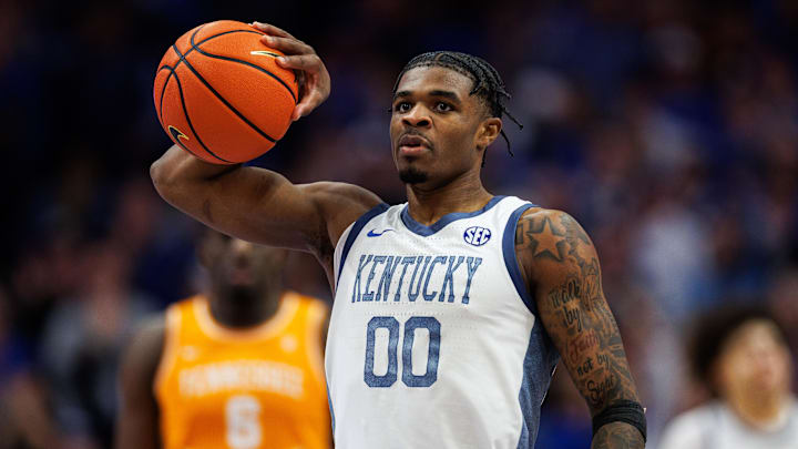 Feb 7, 2026; Lexington, Kentucky, USA; Kentucky Wildcats guard Otega Oweh (00) holds the ball after being fouled during the second half against the Tennessee Volunteers at Rupp Arena at Central Bank Center. Mandatory Credit: Jordan Prather-Imagn Images