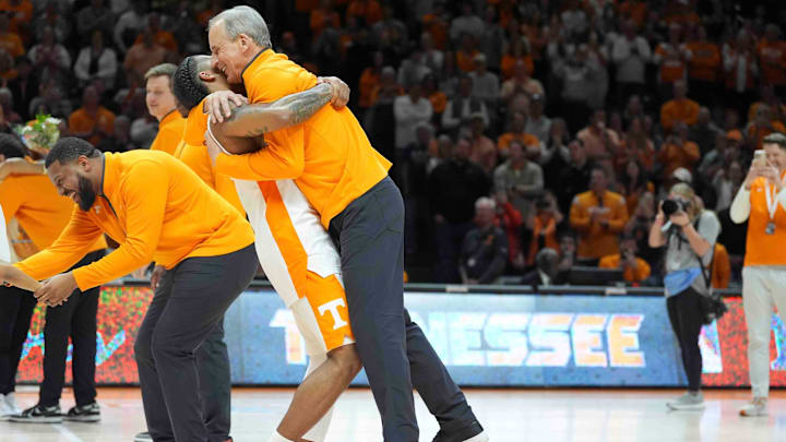 Tennessee's Zakai Zeigler (5) lifts Tennessee head coach Rick Barnes off the ground during Senior Day presentations after a men’s college basketball game between Tennessee and South Carolina at Thompson-Boling Arena at Food City Center, Saturday, March 8, 2025.