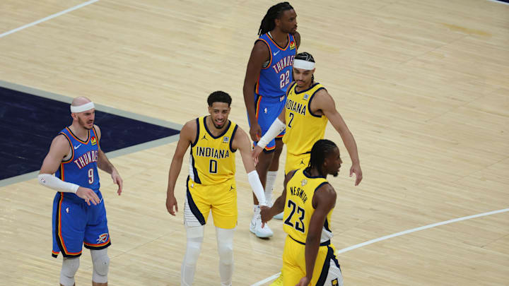 Jun 13, 2025; Indianapolis, Indiana, USA; Indiana Pacers guard Tyrese Haliburton (0) high-fives forward Aaron Nesmith (23) after shooting a free throw during the second quarter against the Oklahoma City Thunder of game four of the 2025 NBA Finals at Gainbridge Fieldhouse. Mandatory Credit: Trevor Ruszkowski-Imagn Images