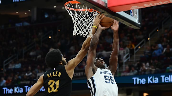 Apr 10, 2024; Cleveland, Ohio, USA; Cleveland Cavaliers center Jarrett Allen (31) blocks the shot of Memphis Grizzlies center Trey Jemison (55) during the second half at Rocket Mortgage FieldHouse. Mandatory Credit: Ken Blaze-USA TODAY Sports