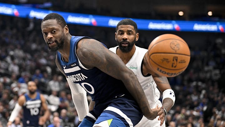 Jan 22, 2025; Dallas, Texas, USA; Minnesota Timberwolves forward Julius Randle (30) and Dallas Mavericks guard Kyrie Irving (11) look for the loose ball during the first quarter at the American Airlines Center. Mandatory Credit: Jerome Miron-Imagn Images Jan 22, 2025; Dallas, Texas, USA; Minnesota Timberwolves forward Julius Randle (30) and Dallas Mavericks guard Kyrie Irving (11) look for the loose ball during the first quarter at the American Airlines Center. Mandatory Credit: Jerome Miron-Imagn Images