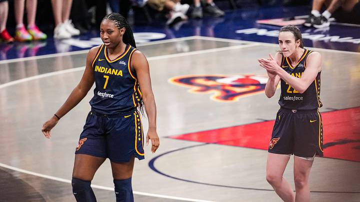 Indiana Fever guard Caitlin Clark (22) claps her hands in excitement with Indiana Fever forward Aliyah Boston (7) on Sunday, July 13, 2025, during the game at Gainbridge Fieldhouse in Indianapolis. Indiana Fever guard Caitlin Clark (22) claps her hands in excitement with Indiana Fever forward Aliyah Boston (7) on Sunday, July 13, 2025, during the game at Gainbridge Fieldhouse in Indianapolis.
