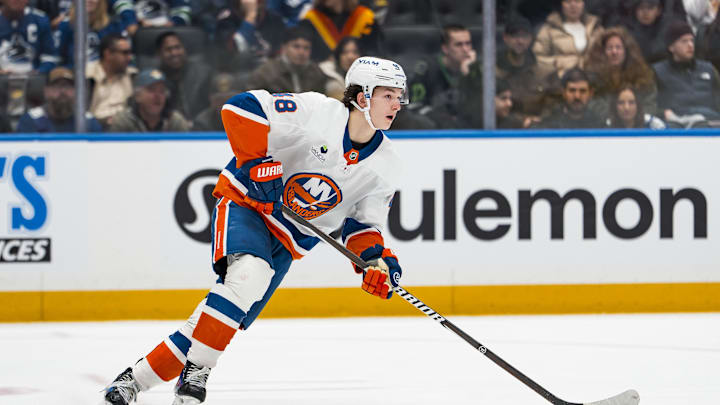 Jan 19, 2026; Vancouver, British Columbia, CAN; New York Islanders defenseman Matthew Schaefer (48) plays the puck against the Vancouver Canucks in the second period at Rogers Arena. Mandatory Credit: Bob Frid-Imagn Images