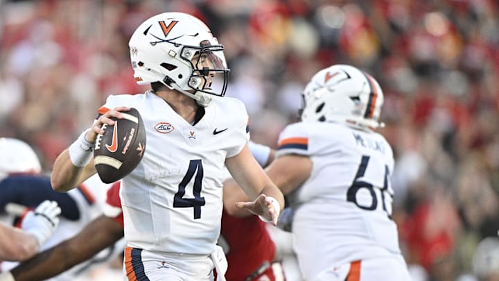Oct 4, 2025; Louisville, Kentucky, USA; Virginia Cavaliers quarterback Chandler Morris (4) looks to pass against the Louisville Cardinals during the second half at L&N Federal Credit Union Stadium. Virginia defeated Louisville 30-27. Mandatory Credit: Jamie Rhodes-Imagn Images Oct 4, 2025; Louisville, Kentucky, USA; Virginia Cavaliers quarterback Chandler Morris (4) looks to pass against the Louisville Cardinals during the second half at L&N Federal Credit Union Stadium. Virginia defeated Louisville 30-27. Mandatory Credit: Jamie Rhodes-Imagn Images
