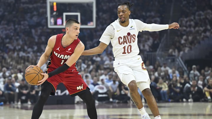 Apr 20, 2025; Cleveland, Ohio, USA; Cleveland Cavaliers guard Darius Garland (10) defends Miami Heat guard Tyler Herro (14) in the first quarter at Rocket Arena. Mandatory Credit: David Richard-Imagn Images