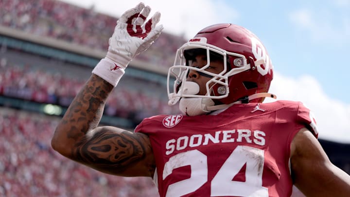 Oklahoma running back Xavier Robinson celebrates after rushing for a touchdown against Ole Miss. Oklahoma running back Xavier Robinson celebrates after rushing for a touchdown against Ole Miss.