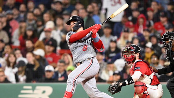 Sep 20, 2024; Boston, Massachusetts, USA; Minnesota Twins catcher Christian Vazquez (8) bats against the Boston Red Sox during the seventh inning at Fenway Park.