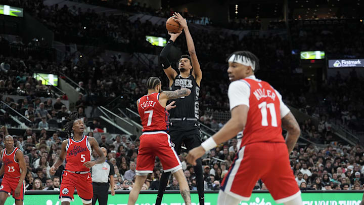 Dec 31, 2024; San Antonio, Texas, USA;  San Antonio Spurs center Victor Wembanyama (1) shoots over LA Clippers guard Amir Coffey (7) in the second half at Frost Bank Center. Mandatory Credit: Daniel Dunn-Imagn Images
