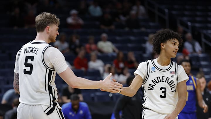 Mar 19, 2026; Oklahoma City, OK, USA; Vanderbilt Commodores forward Tyler Nickel (5) and guard Tyler Tanner (3) celebrate after defeating the McNeese Cowboys during a first round game of the men's 2026 NCAA Tournament at Paycom Center. Mandatory Credit: Alonzo Adams-Imagn Images Mar 19, 2026; Oklahoma City, OK, USA; Vanderbilt Commodores forward Tyler Nickel (5) and guard Tyler Tanner (3) celebrate after defeating the McNeese Cowboys during a first round game of the men's 2026 NCAA Tournament at Paycom Center. Mandatory Credit: Alonzo Adams-Imagn Images