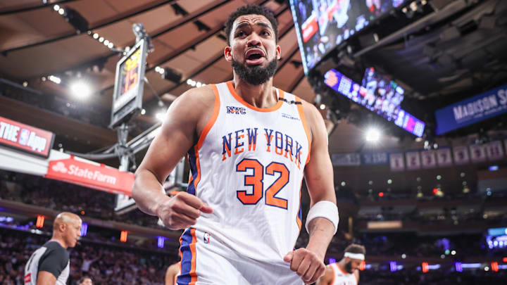 Apr 29, 2025; New York, New York, USA; New York Knicks center Karl-Anthony Towns (32) reacts after being called for a foul in the fourth quarter against the Detroit Pistons during game five of first round for the 2025 NBA Playoffs at Madison Square Garden. Mandatory Credit: Wendell Cruz-Imagn Images