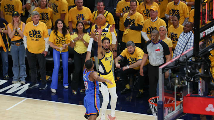 Jun 19, 2025; Indianapolis, Indiana, USA; Indiana Pacers guard Tyrese Haliburton (0) shoots the ball against Oklahoma City Thunder guard Aaron Wiggins (21) in the first quarter during game six of the 2025 NBA Finals at Gainbridge Fieldhouse. Mandatory Credit: Trevor Ruszkowski-Imagn Images