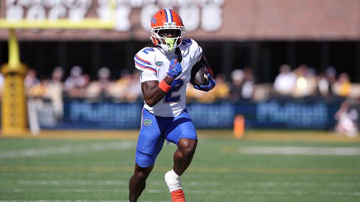 Oct 3, 2026; Columbia, Missouri, USA;  Florida Gators wide receiver Eric Singleton Jr. (2) carries the ball in the first quarter against the Missouri Tigers at Faurot Field at Memorial Stadium.  Mandatory Credit: William Purnell-Imagn Images