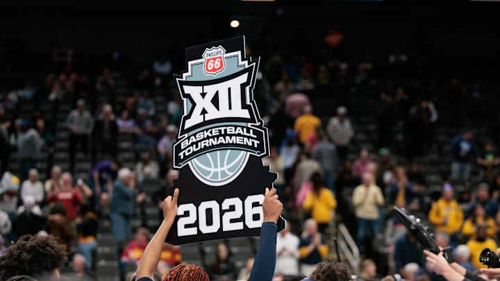 Mar 8, 2026; Kansas City, MO, USA; West Virginia Mountaineers hold up a championship banner after the game against the TCU Horned Frogs at T-Mobile Center. Mandatory Credit: William Purnell-Imagn Images Mar 8, 2026; Kansas City, MO, USA; West Virginia Mountaineers hold up a championship banner after the game against the TCU Horned Frogs at T-Mobile Center. Mandatory Credit: William Purnell-Imagn Images