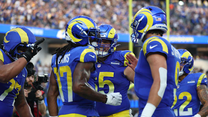Nov 2, 2025; Inglewood, California, USA; Los Angeles Rams wide receiver Davante Adams (17) and center Coleman Shelton (65) celebrate a touchdown New Orleans Saints during the second half at SoFi Stadium. Mandatory Credit: Kiyoshi Mio-Imagn Images