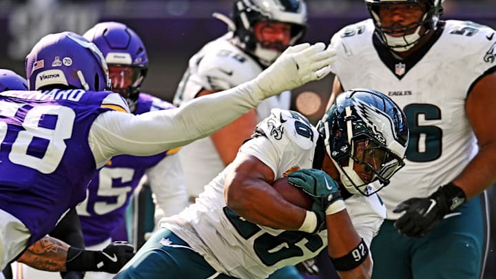 Oct 19, 2025; Minneapolis, Minnesota, USA; Philadelphia Eagles running back Saquon Barkley (26) controls the ball during the second half against the Minnesota Vikings at U.S. Bank Stadium. Mandatory Credit: Jeffrey Becker-Imagn Images