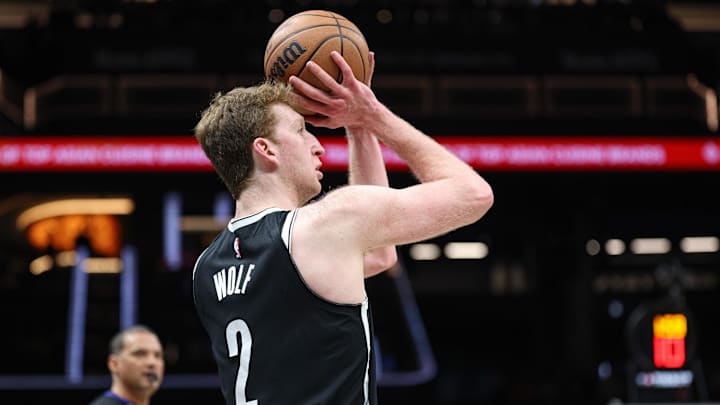 Jan 1, 2026; Brooklyn, New York, USA; Brooklyn Nets forward Danny Wolf (2) shoots the ball against the Houston Rockets during the first half at Barclays Center. Mandatory Credit: Vincent Carchietta-Imagn Images