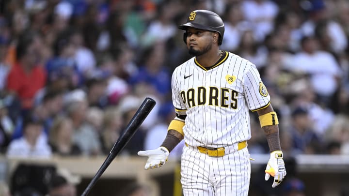 Aug 24, 2024; San Diego, California, USA; San Diego Padres first baseman Luis Arraez (4) flips his bat during the fifth inning against the New York Mets at Petco Park. Mandatory Credit: Orlando Ramirez-USA TODAY Sports