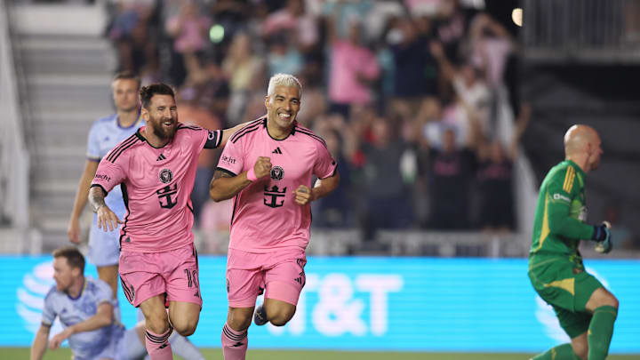 Oct 25, 2024; Fort Lauderdale, Florida, USA; Inter Miami CF forward Lionel Messi (10) and Inter Miami CF forward Luis Suarez (9) celebrate a first half goal by Suarez against Atlanta United in a 2024 MLS Cup Playoffs Round One match  at Chase Stadium. Mandatory Credit: Sam Navarro-Imagn Images