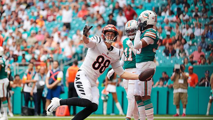 Dec 21, 2025; Miami Gardens, Florida, USA; Cincinnati Bengals tight end Mike Gesicki (88) catches a touchdown over Miami Dolphins cornerback Jason Marshall Jr. (33) during the fourth quarter at Hard Rock Stadium. Mandatory Credit: Sam Navarro-Imagn Images Dec 21, 2025; Miami Gardens, Florida, USA; Cincinnati Bengals tight end Mike Gesicki (88) catches a touchdown over Miami Dolphins cornerback Jason Marshall Jr. (33) during the fourth quarter at Hard Rock Stadium. Mandatory Credit: Sam Navarro-Imagn Images