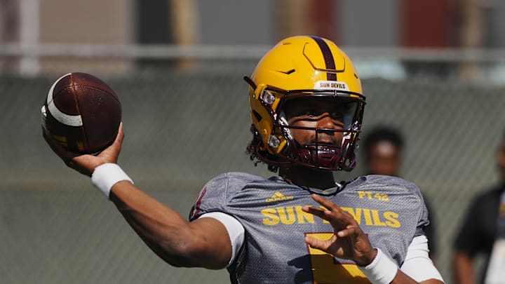 ASU quarterback Jaden Rashada (5) throws a pass during a spring practice at the Kajikawa practice fields in Tempe on April 16, 2024. ASU quarterback Jaden Rashada (5) throws a pass during a spring practice at the Kajikawa practice fields in Tempe on April 16, 2024.