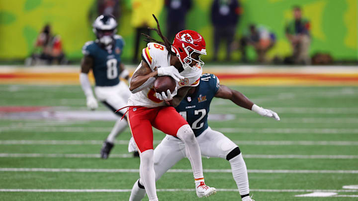 Feb 9, 2025; New Orleans, LA, USA; Kansas City Chiefs wide receiver DeAndre Hopkins (8) controls the ball against Philadelphia Eagles linebacker Oren Burks (42) during the second half of Super Bowl LIX at Caesars Superdome. Mandatory Credit: Bill Streicher-Imagn Images