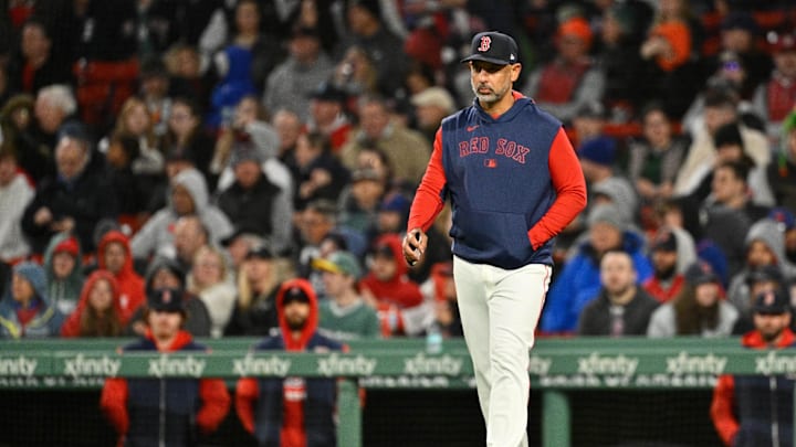 Boston Red Sox manager Alex Cora (13) walks to the mound during the sixth inning against the New York Mets at Fenway Park on May 21. Boston Red Sox manager Alex Cora (13) walks to the mound during the sixth inning against the New York Mets at Fenway Park on May 21.