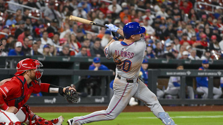 May 2, 2025; St. Louis, Missouri, USA;  New York Mets first baseman Pete Alonso (20) hits a two run home run against the St. Louis Cardinals during the fifth inning at Busch Stadium. Mandatory Credit: Jeff Curry-Imagn Images