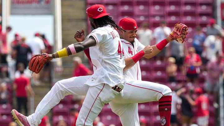 Cincinnati Reds shortstop Elly de la Cruz (44) and right fielder Noelvi Marte (4) celebrate a win after the ninth inning of the MLB Interleague game between the Cincinnati Reds and the Athletics at Great American Ball Park in downtown Cincinnati on Thursday, Aug. 6, 2026. The Reds completed a sweet of the Athletics with a 6-5 win. Cincinnati Reds shortstop Elly de la Cruz (44) and right fielder Noelvi Marte (4) celebrate a win after the ninth inning of the MLB Interleague game between the Cincinnati Reds and the Athletics at Great American Ball Park in downtown Cincinnati on Thursday, Aug. 6, 2026. The Reds completed a sweet of the Athletics with a 6-5 win.