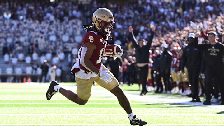 Nov 9, 2024; Chestnut Hill, Massachusetts, USA; Boston College Eagles wide receiver Lewis Bond (11) runs for a touchdown against the Syracuse Orange during the first half at Alumni Stadium. Mandatory Credit: Brian Fluharty-Imagn Images