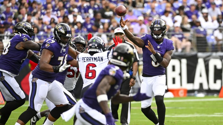 Sep 10, 2023; Baltimore, Maryland, USA; Baltimore Ravens quarterback Lamar Jackson (8) throws a pass to wide receiver Zay Flowers (4) against the Houston Texans during the second half at M&T Bank Stadium. Mandatory Credit: Brad Mills-USA TODAY Sports
Sep 10, 2023; Baltimore, Maryland, USA; Baltimore Ravens quarterback Lamar Jackson (8) throws a pass to wide receiver Zay Flowers (4) against the Houston Texans during the second half at M&T Bank Stadium. Mandatory Credit: Brad Mills-USA TODAY Sports
