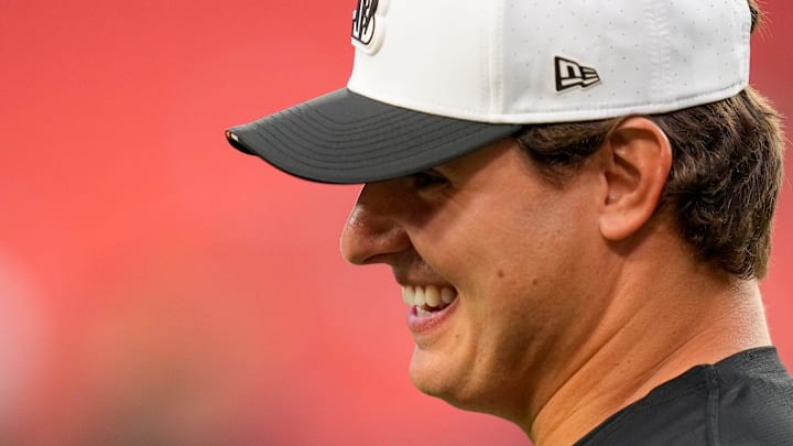 Cincinnati Bengals defensive end Trey Hendrickson (91) talks with director of player personnel Duke Tobin before the first quarter of the NFL Preseason Week 2 game between the Washington Commanders and the Cincinnati Bengals at Northwest Stadium in Landover, Md., on Monday, Aug. 18, 2025.