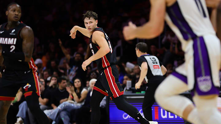 Nov 4, 2024; Miami, Florida, USA; Miami Heat guard Pelle Larsson (9) reacts after scoring against the Sacramento Kings during the second quarter at Kaseya Center. Mandatory Credit: Sam Navarro-Imagn Images