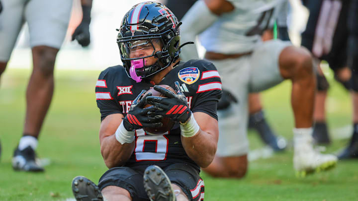 Texas Tech Red Raiders running back Cameron Dickey (8) reacts after a carry against the Oregon Ducks. Mandatory Credit: Sam Navarro-Imagn Images