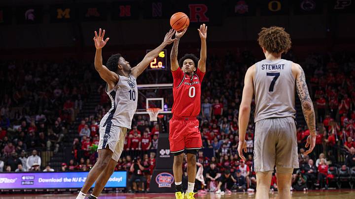 Mar 8, 2026; Piscataway, New Jersey, USA; Rutgers Scarlet Knights guard Tariq Francis (0) shoots the ball against Penn State Nittany Lions forward Josh Reed (10) during the first half at Jersey Mike's Arena. Mandatory Credit: Vincent Carchietta-Imagn Images