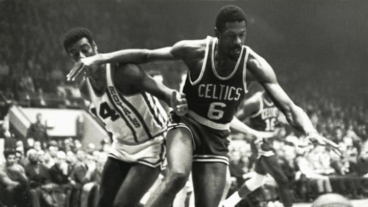 Unknown date; Cincinnati, OH, USA; FILE PHOTO; Boston Celtics center Bill Russell (6) fights for a loose ball against Cincinnati Royals guard Oscar Robertson (14) at Cincinnati Gardens. Mandatory Credit: Malcolm Emmons-Imagn Images