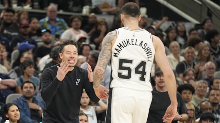 Mar 19, 2025; San Antonio, Texas, USA; San Antonio Spurs interim coach Mitch Johnson yells at forward Sandro Mamukelashvili (54) during the second half against the New York Knicks at Frost Bank Center. Mandatory Credit: Scott Wachter-Imagn Images