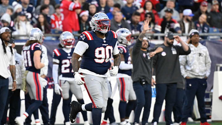 Nov 17, 2024; Foxborough, Massachusetts, USA; New England Patriots defensive tackle Christian Barmore (90) runs to the line during the second half against the Los Angeles Rams at Gillette Stadium. Mandatory Credit: Eric Canha-Imagn Images