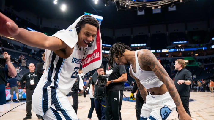 Apr 29, 2022; Minneapolis, Minnesota, USA; Memphis Grizzlies guard Ja Morant (12) and guard Desmond Bane (22) celebrate after the game against the Minnesota Timberwolves after game six of the first round for the 2022 NBA playoffs at Target Center. Mandatory Credit: Brad Rempel-USA TODAY Sports