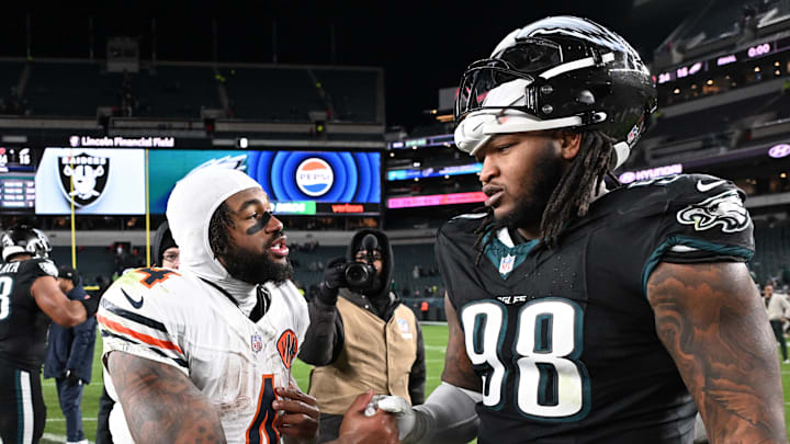 Nov 28, 2025; Philadelphia, Pennsylvania, USA; Chicago Bears running back D'Andre Swift (4) speaks with Philadelphia Eagles defensive tackle Jalen Carter (98) after the game at Lincoln Financial Field. Mandatory Credit: Eric Hartline-Imagn Images