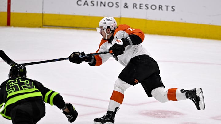 Mar 22, 2025; Dallas, Texas, USA; Philadelphia Flyers right wing Travis Konecny (11) scores a goal against Dallas Stars goaltender Jake Oettinger (not pictured) during the second period at the American Airlines Center. 