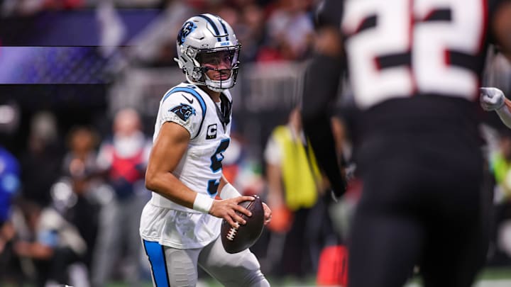 Jan 5, 2025; Atlanta, Georgia, USA; Carolina Panthers quarterback Bryce Young (9) runs for a touchdown against the Atlanta Falcons in the second quarter at Mercedes-Benz Stadium. Mandatory Credit: Brett Davis-Imagn Images Jan 5, 2025; Atlanta, Georgia, USA; Carolina Panthers quarterback Bryce Young (9) runs for a touchdown against the Atlanta Falcons in the second quarter at Mercedes-Benz Stadium. Mandatory Credit: Brett Davis-Imagn Images