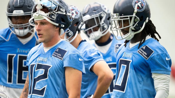 Wide receivers Mason Kinsey (12) and Calvin Ridley (0) listen to wide receivers coach Tyke Tolbert during the Tennessee Titans mandatory mini-camp at Ascension Saint Thomas Sports Park in Nashville, Tenn., Tuesday, June 4, 2024. Wide receivers Mason Kinsey (12) and Calvin Ridley (0) listen to wide receivers coach Tyke Tolbert during the Tennessee Titans mandatory mini-camp at Ascension Saint Thomas Sports Park in Nashville, Tenn., Tuesday, June 4, 2024.